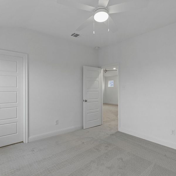 Representative unfurnished interior of a home built from the The Emery by Village Homes in Walsh, Aledo (Image 12).