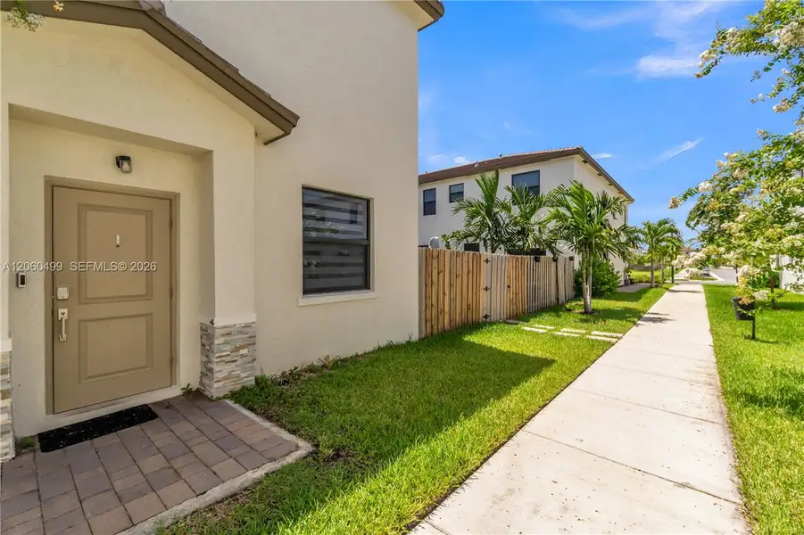 Exterior details and patio area of a home in , Miami (Image 4).