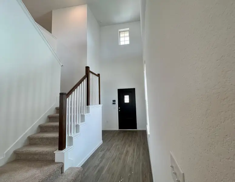 Spacious, unfurnished interior of a new home in Sunterra, Katy (Image 16). Spacious, unfurnished interior of a new home in Sunterra, Katy (Image 16).