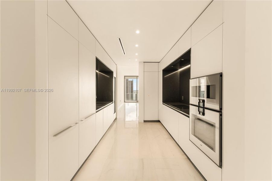 Spacious, unfurnished interior of a new home in Aston Martin Residences, Miami (Image 21). Spacious, unfurnished interior of a new home in Aston Martin Residences, Miami (Image 21).