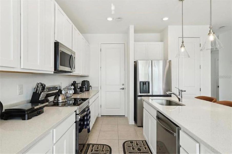 Furnished interior view inside a new home in , Davenport (Image 13).