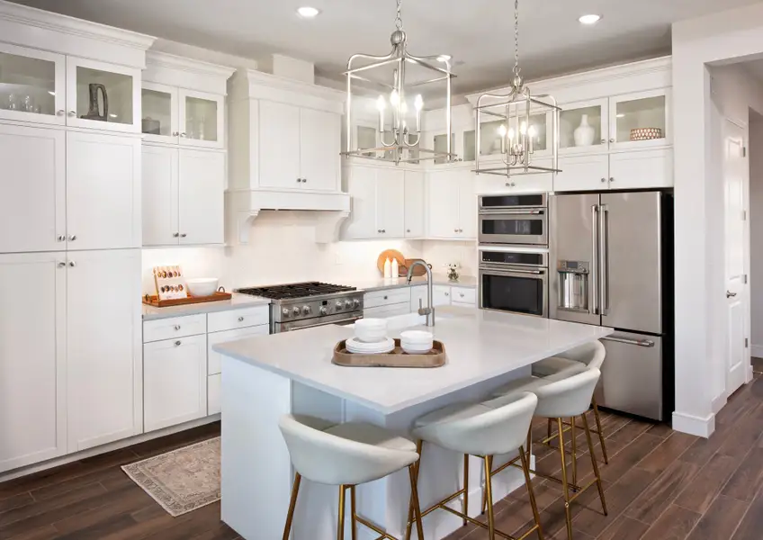Kitchen with glass upper cabinets and pendant lighting Kitchen with glass upper cabinets and pendant lighting