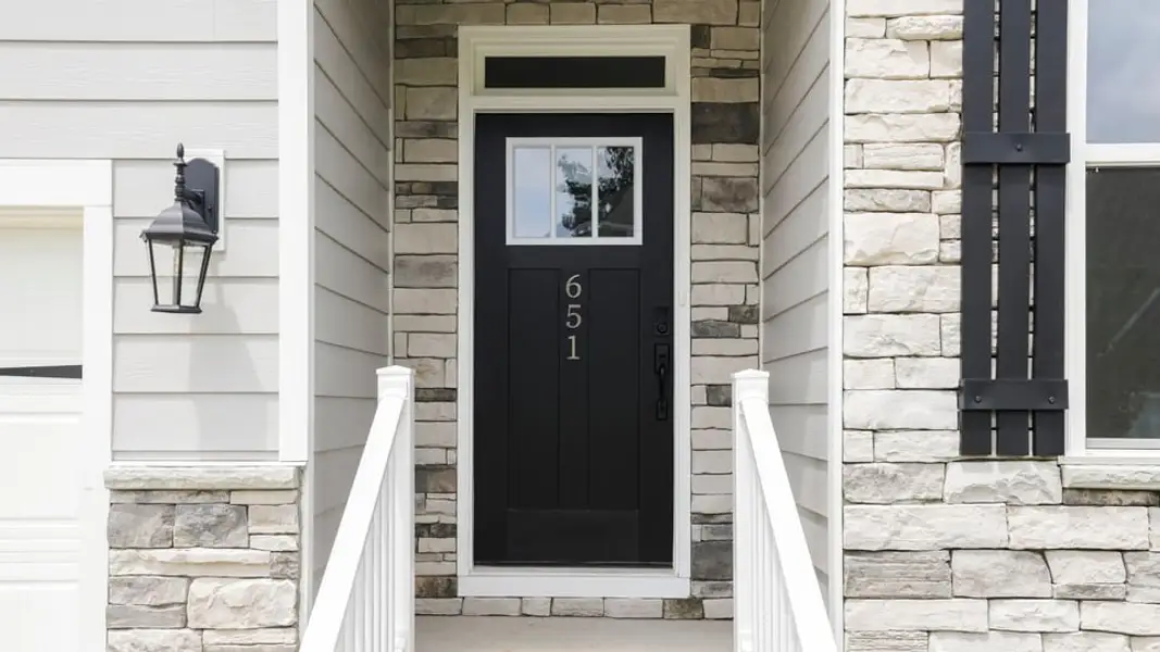 Exterior details and patio area of a home in Sunset Summits, Spartanburg (Image 3).