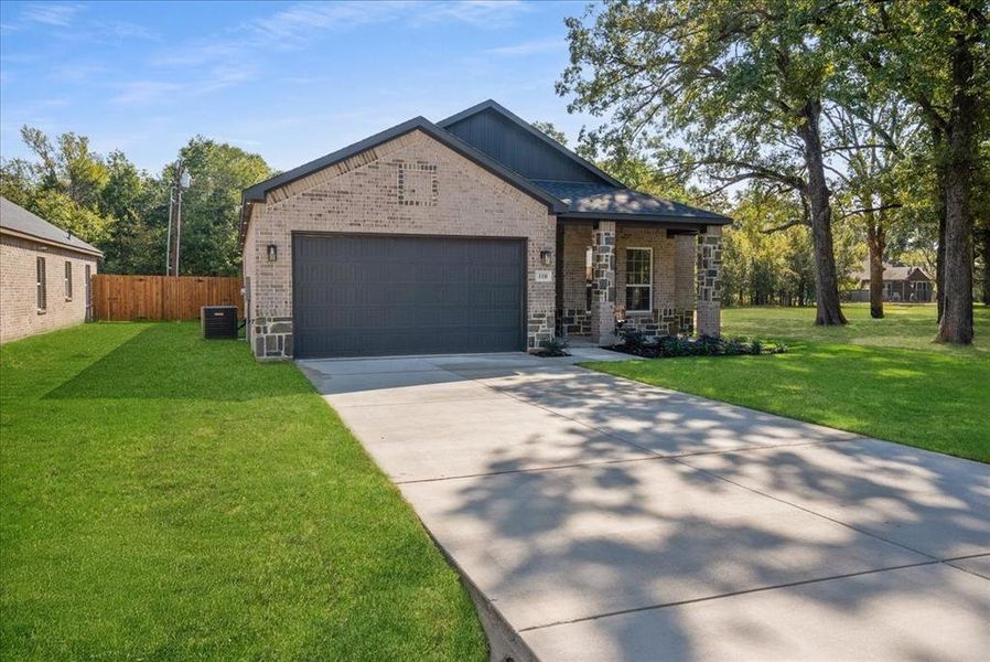 Front exterior of a new home in , Trinidad, TX, highlighting curb appeal (Image 2). Front exterior of a new home in , Trinidad, TX, highlighting curb appeal (Image 2).