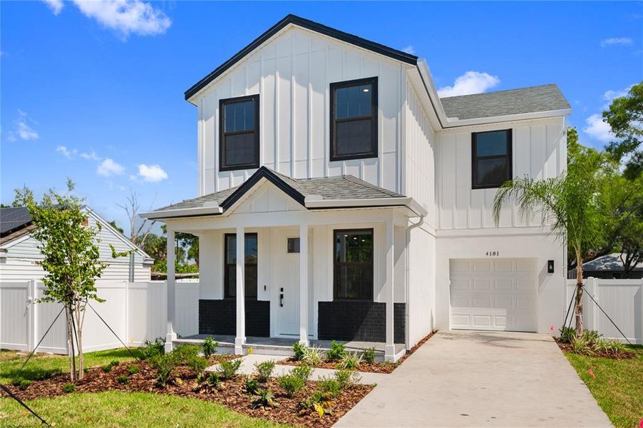Front exterior of a new home in , St. Petersburg, FL, highlighting curb appeal (Image 24). Front exterior of a new home in , St. Petersburg, FL, highlighting curb appeal (Image 24).