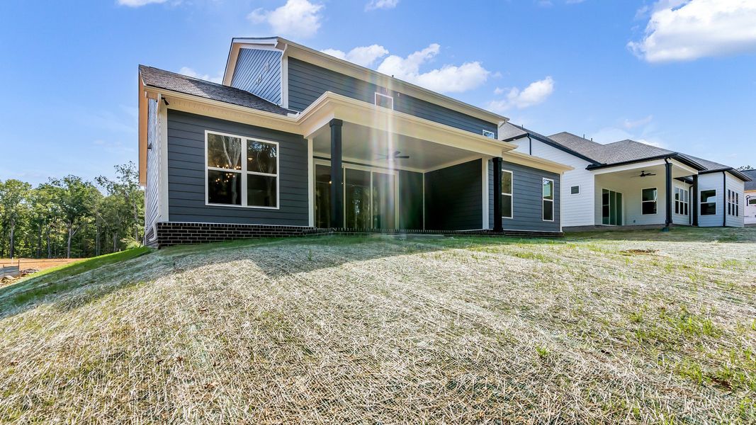 Exterior details and patio area of a home in Brush Creek, Fairview (Image 25).