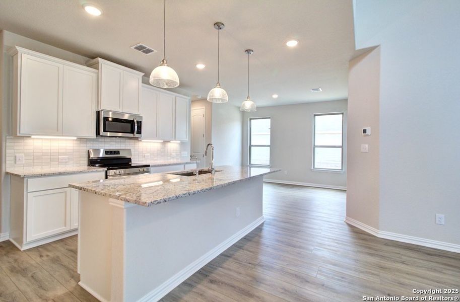 Furnished interior view inside a new home in Casinas at Gruene, New Braunfels (Image 6).