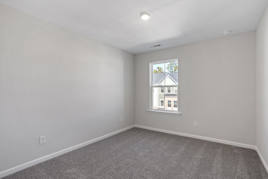 Spacious, unfurnished interior of a new home in Renaissance at White Oak, Garner (Image 29).