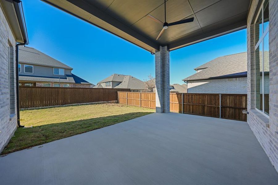 Exterior details and patio area of a home in Estates at Rockhill, Frisco (Image 4). Exterior details and patio area of a home in Estates at Rockhill, Frisco (Image 4).
