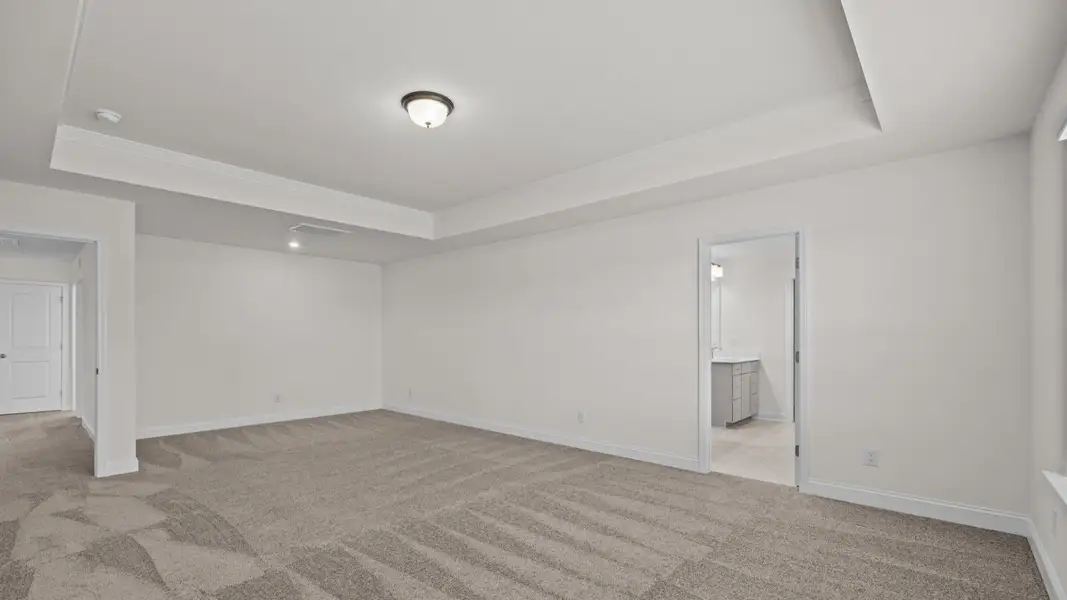 The Norris Plan by DRB Homes in Michaux Gardens - Primary Suite (Representative Photo) The Norris Plan by DRB Homes in Michaux Gardens - Primary Suite (Representative Photo)