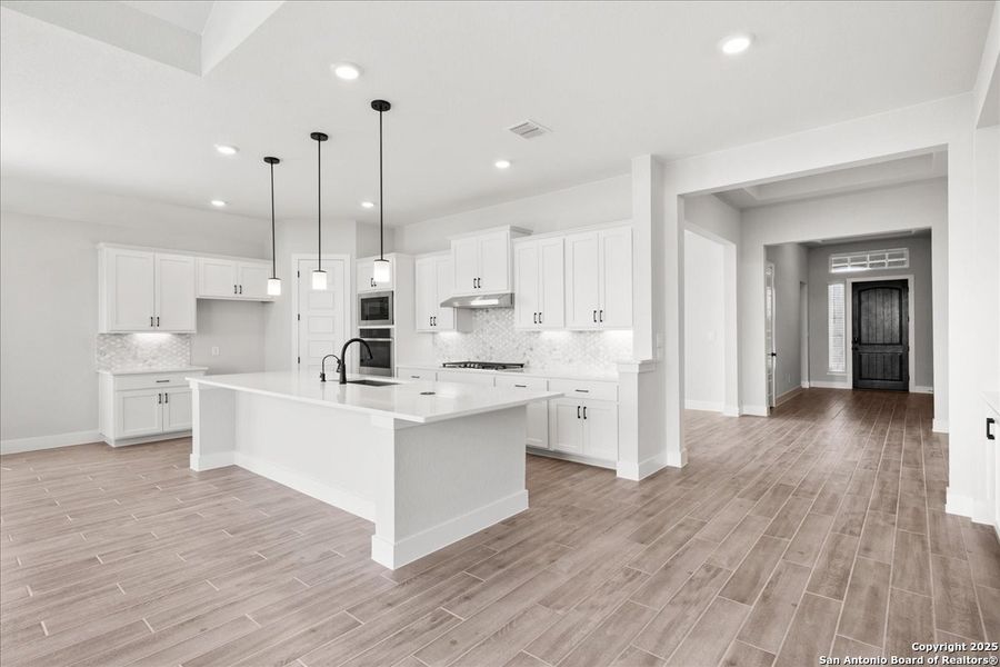 Furnished interior view inside a new home in Village at Three Oaks, Seguin (Image 7). Furnished interior view inside a new home in Village at Three Oaks, Seguin (Image 7).