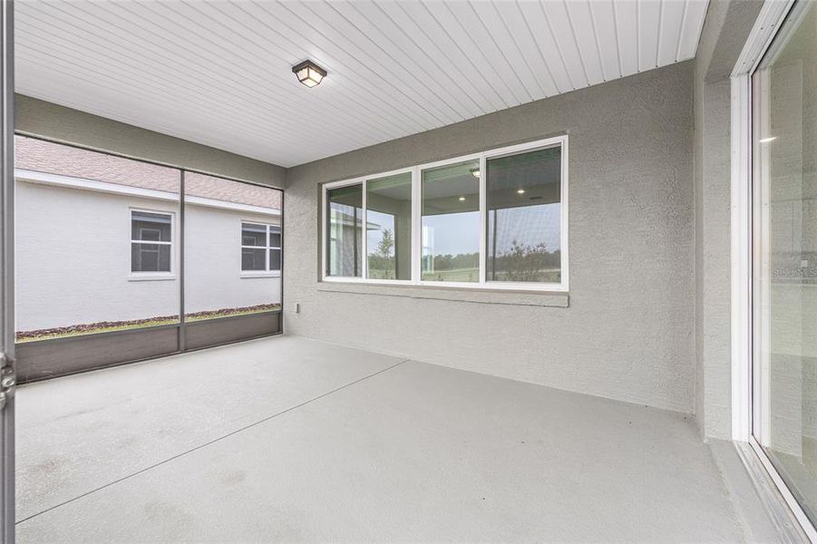 Exterior details and patio area of a home in On Top of the World Communities, Ocala (Image 25).