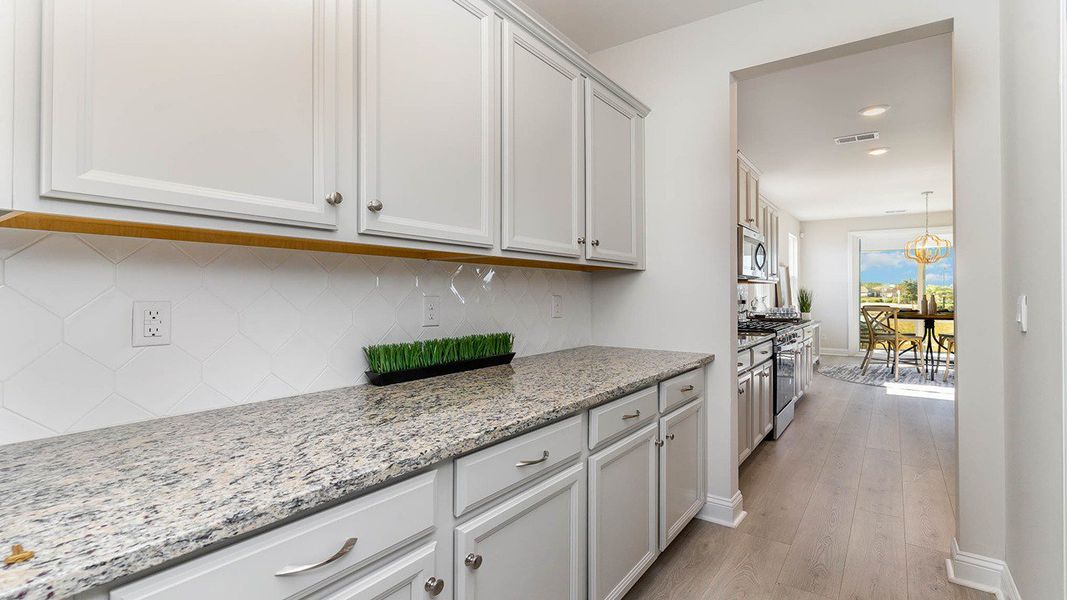 Furnished interior view inside a new home in Rich Square at Brunswick Plantation, Ash (Image 12). Furnished interior view inside a new home in Rich Square at Brunswick Plantation, Ash (Image 12).