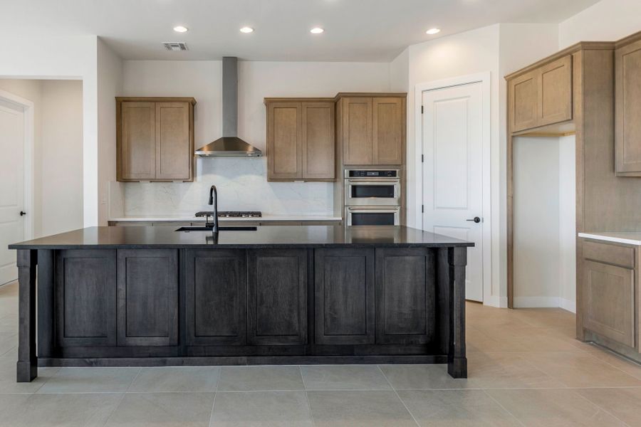 Furnished interior view inside a new home in Saguaro Reserve - Majesty, Marana (Image 6).