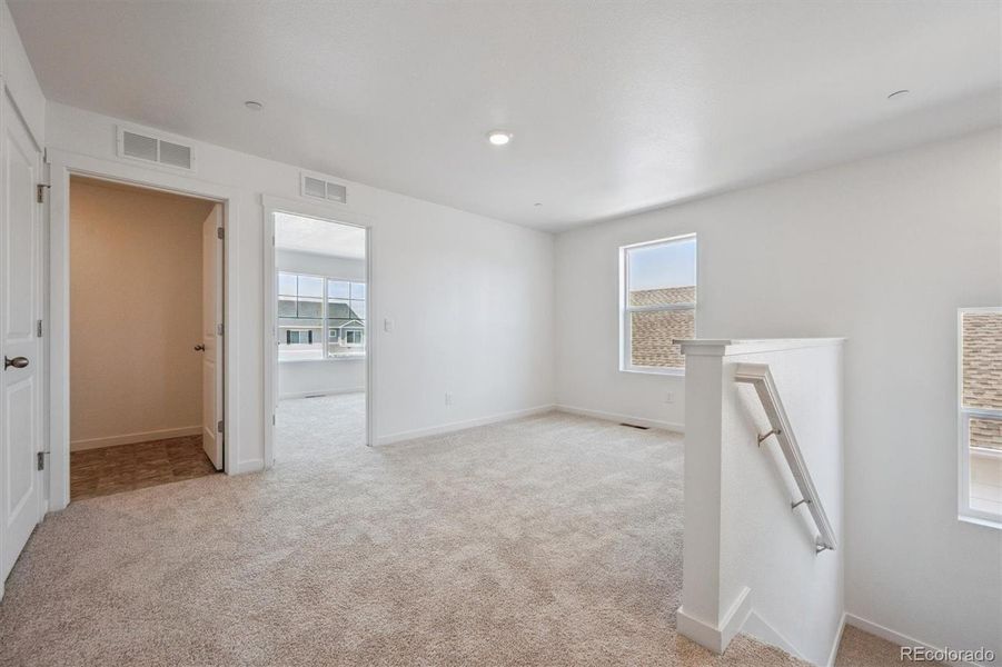 Spacious, unfurnished interior of a new home in Silver Peaks, Lochbuie (Image 12).