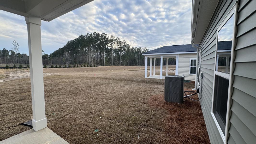 Exterior details and patio area of a home in Watson Hill, Summerville (Image 3).