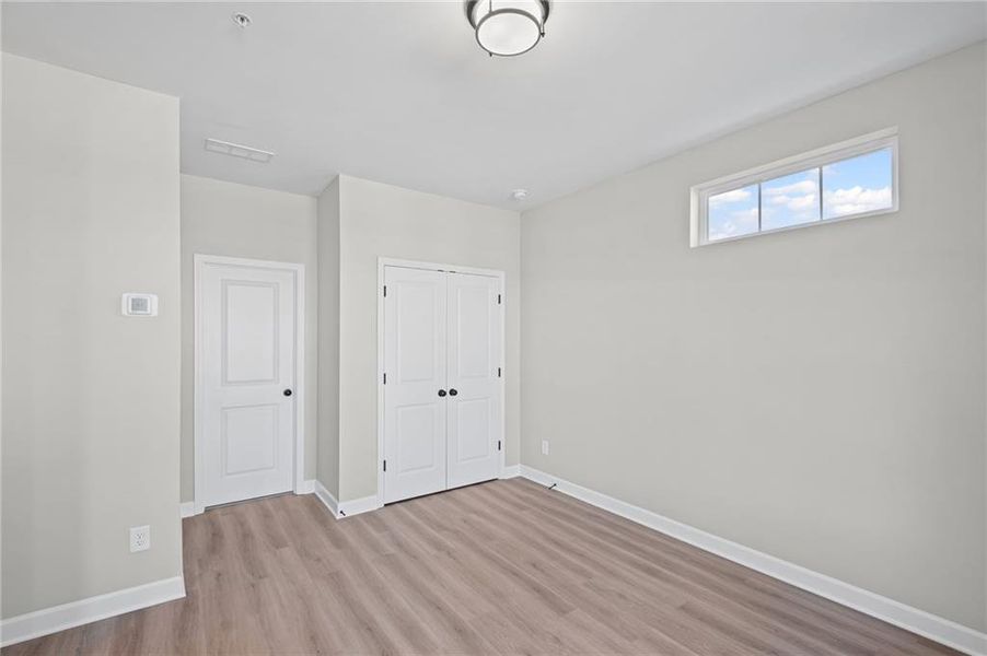Spacious, unfurnished interior of a new home in The Village at River Green, Canton (Image 27).