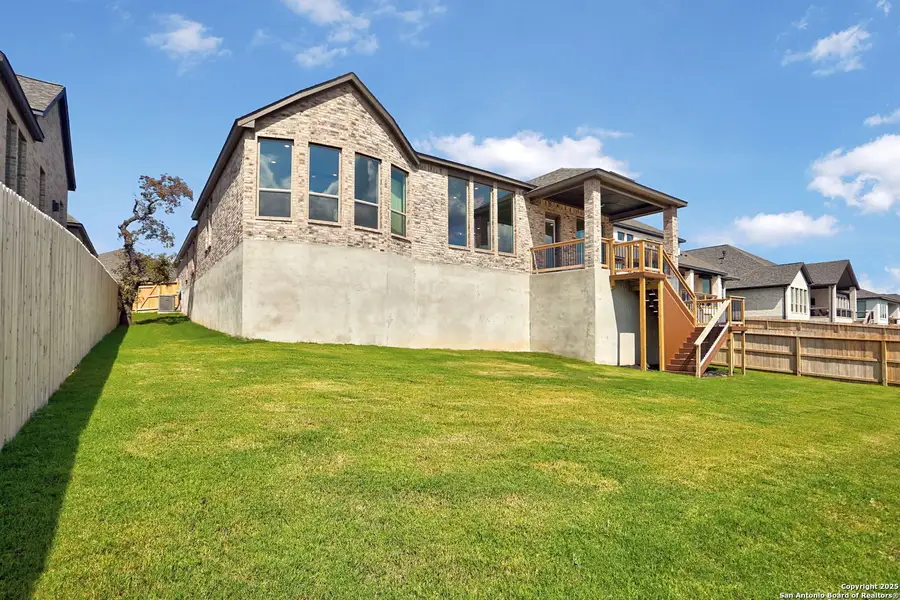 Exterior details and patio area of a home in Kinder Ranch 70's, San Antonio (Image 3).