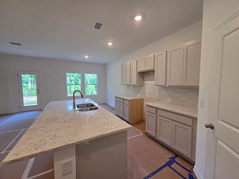 Kitchen featuring Milan Collection Finishes Construction Progress