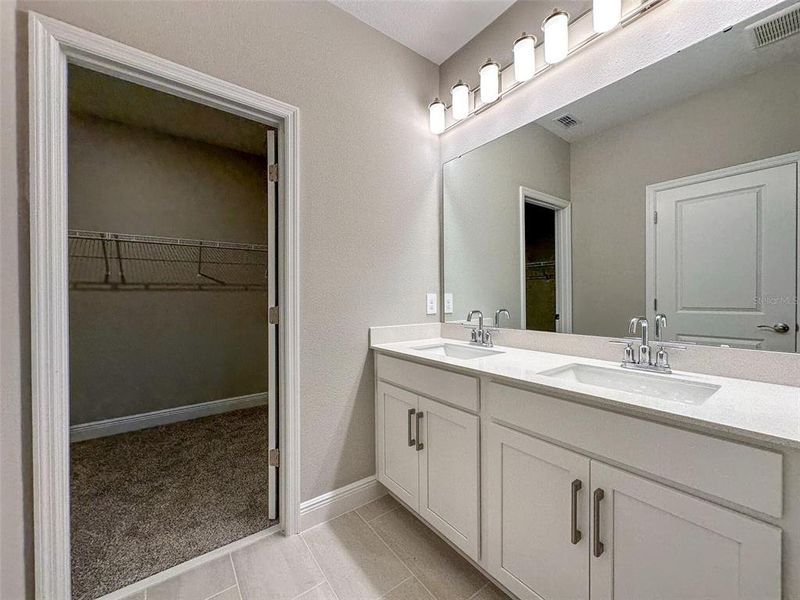 Furnished interior view inside a new home in Silverleaf Reserve Bungalows, Winter Garden (Image 11).