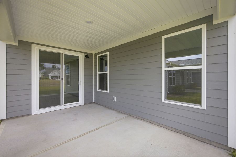 Exterior details and patio area of a home in Terrapin, Leland (Image 19).