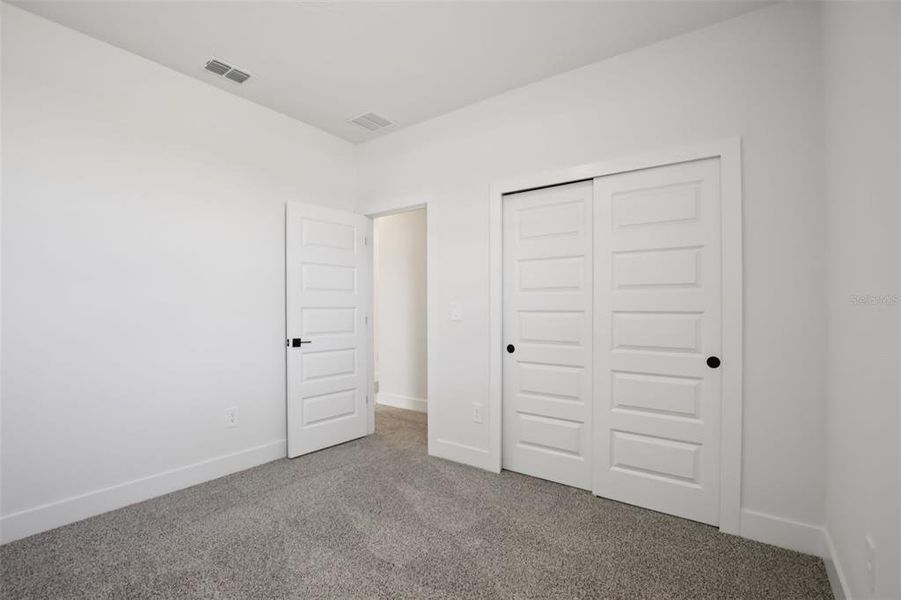 Spacious, unfurnished interior of a new home in Magnolia Bay - Reserve Series, Nokomis (Image 33).