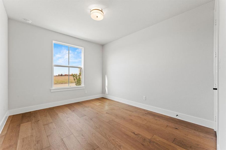 Unfurnished room featuring light hardwood / wood-style floors