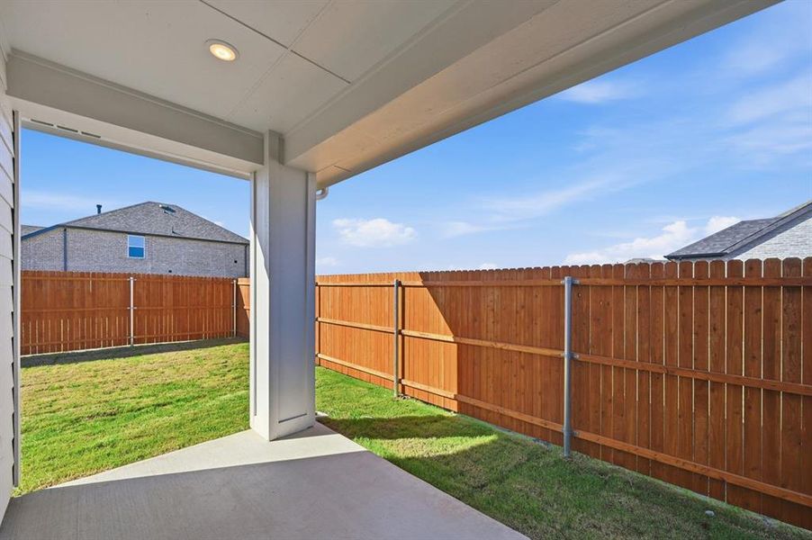Exterior details and patio area of a home in Heartland, Crandall (Image 15).