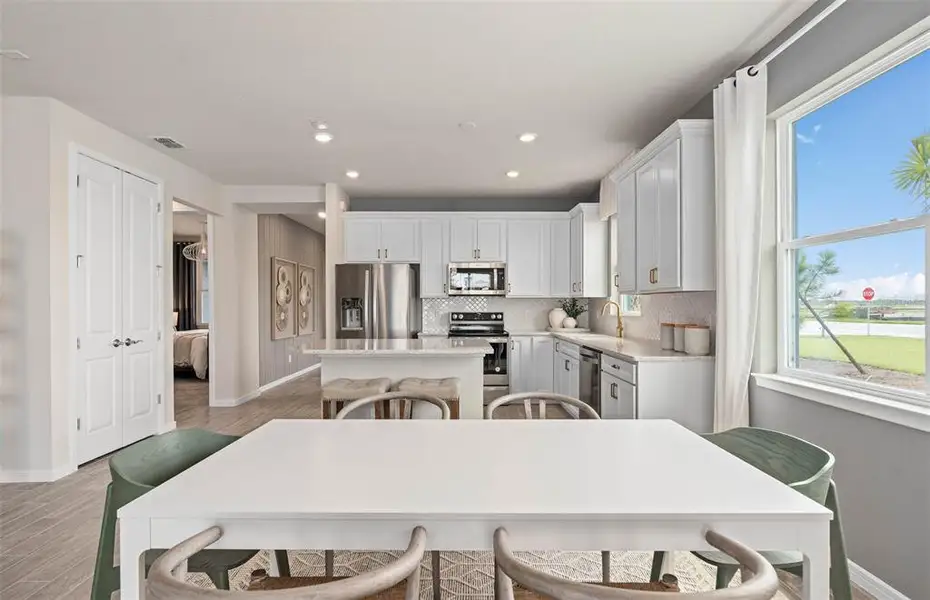 Furnished interior view inside a new home in Del Webb Sunbridge, St. Cloud (Image 9).