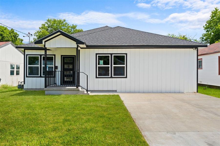 Front exterior of a new home in , Dallas, TX, highlighting curb appeal (Image 19).