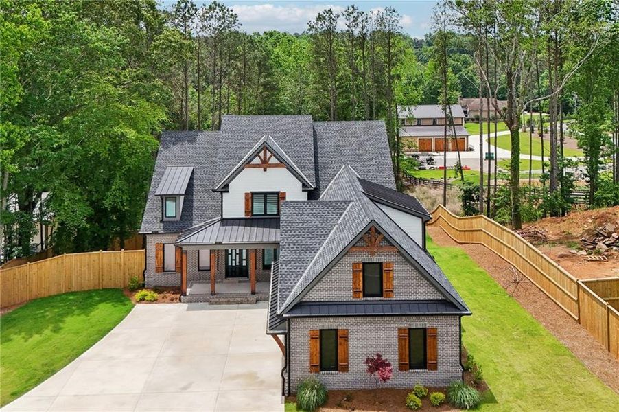 Front exterior of a new home in , Cumming, GA, highlighting curb appeal (Image 33). Front exterior of a new home in , Cumming, GA, highlighting curb appeal (Image 33).