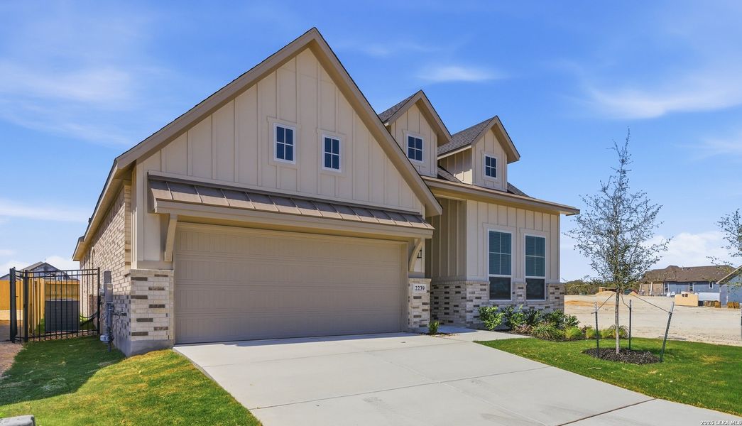 Front exterior of a new home in Prominence Urban, San Antonio, TX, highlighting curb appeal (Image 27). Front exterior of a new home in Prominence Urban, San Antonio, TX, highlighting curb appeal (Image 27).