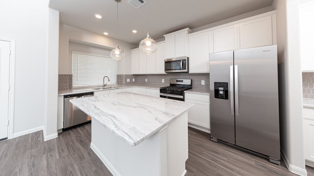 Representative furnished interior of a home built from the The Hawthorn by Legend Homes in Rocky Creek Crossing, Crowley (Image 6).
