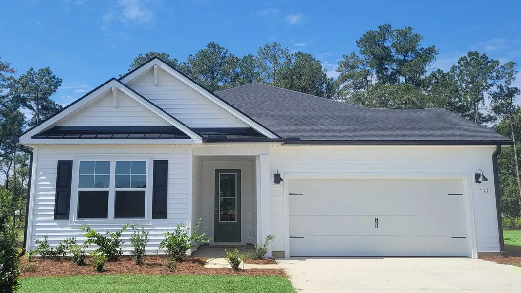 Front exterior of a new home in Coastal Farms, Conway, SC, highlighting curb appeal (Image 1).