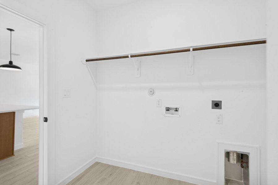 Laundry room (*Photo not of actual home and used for illustration purposes only.)