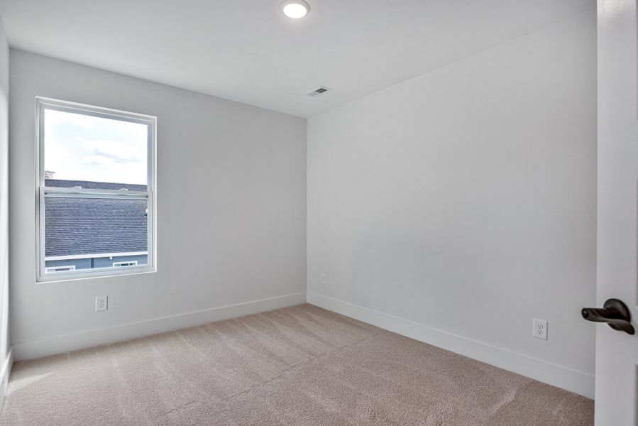 Representative unfurnished interior of a home built from the Ingram Rowhome by Parkside Builders in Anderson Park, Hendersonville (Image 26).