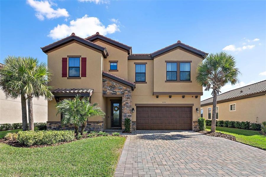 Front exterior of a new home in , Parrish, FL, highlighting curb appeal (Image 23).