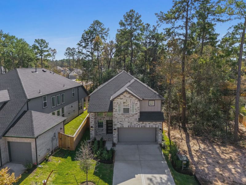 Representative exterior photo of a completed home built from the San Francisco by Chesmar Homes in The Woodlands Hills, Willis, TX (Image 28). Representative exterior photo of a completed home built from the San Francisco by Chesmar Homes in The Woodlands Hills, Willis, TX (Image 28).