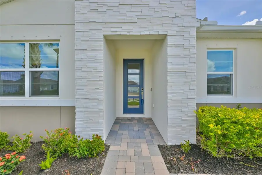 Exterior details and patio area of a home in , Parrish (Image 4).