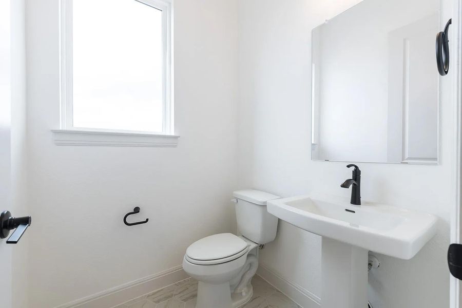 Furnished interior view inside a new home in Lariat - 70', Liberty Hill (Image 8).