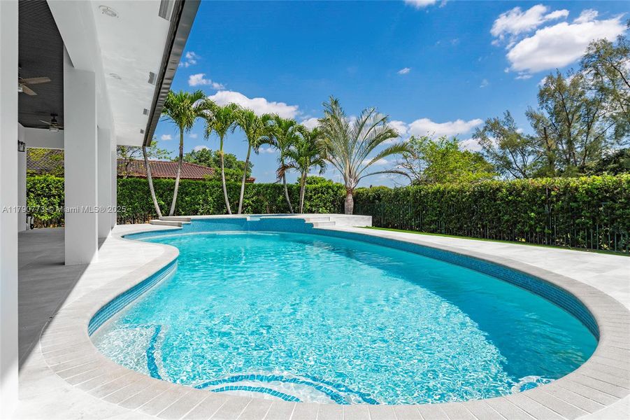 Experience the ultimate backyard retreat with a stunning free-form pool and heated sauna, all set against a lush privacy hedge that creates a serene, secluded oasis perfect for relaxation and entertaining.Experience the ultimate backyard retreat with a stunning free-form pool and heated sauna, all set against a lush privacy hedge that creates a serene, secluded oasis perfect for relaxation and entertaining. Experience the ultimate backyard retreat with a stunning free-form pool and heated sauna, all set against a lush privacy hedge that creates a serene, secluded oasis perfect for relaxation and entertaining.Experience the ultimate backyard retreat with a stunning free-form pool and heated sauna, all set against a lush privacy hedge that creates a serene, secluded oasis perfect for relaxation and entertaining.