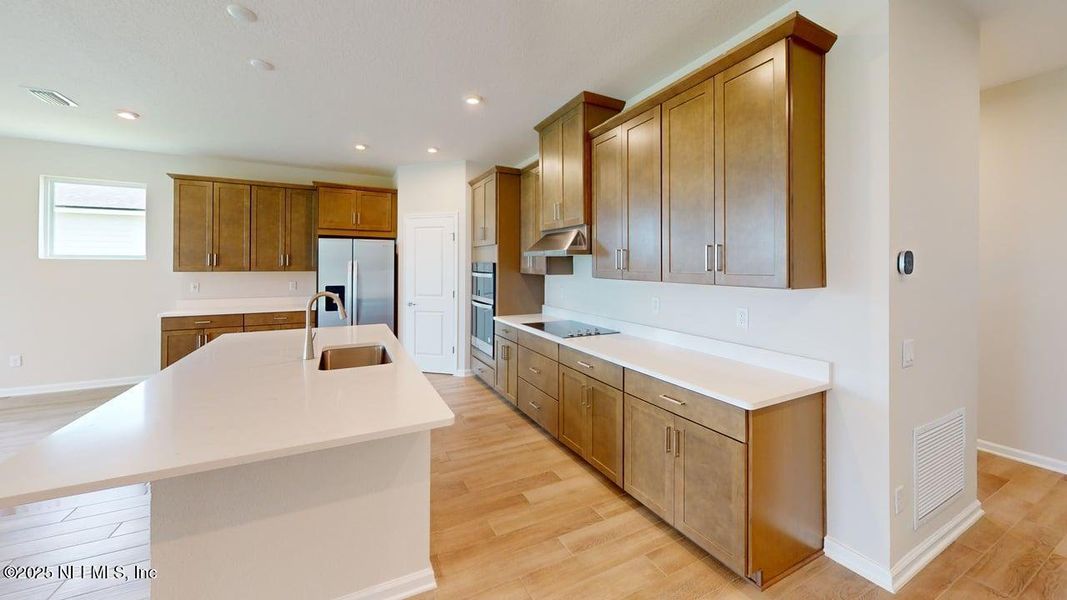 Furnished interior view inside a new home in Lakes at Bella Lago, Green Cove Springs (Image 7).