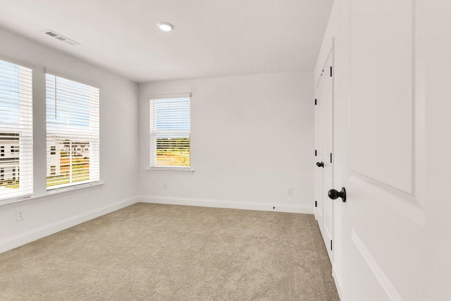 Representative unfurnished interior of a home built from the Titusville II by Regent Homes in Marlon's Creek, Spring Hill (Image 40).