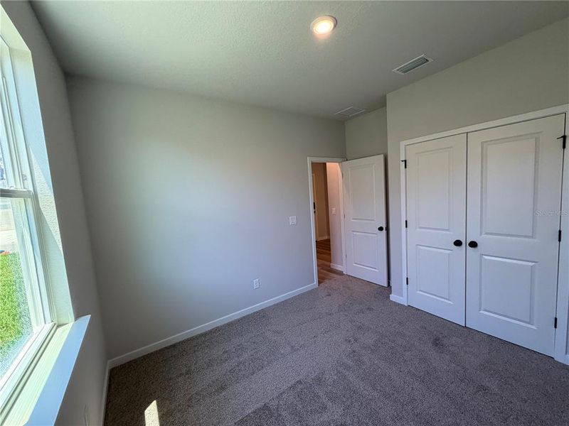 Spacious, unfurnished interior of a new home in Reserve East, Flagler Beach (Image 29).