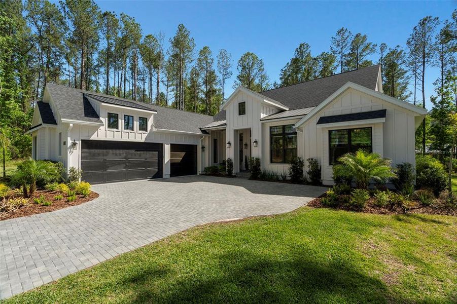 Front exterior of a new home in , Brooksville, FL, highlighting curb appeal (Image 28).