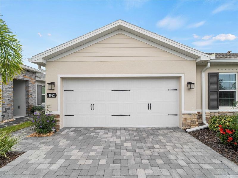 Front exterior of a new home in , Port Charlotte, FL, highlighting curb appeal (Image 1).