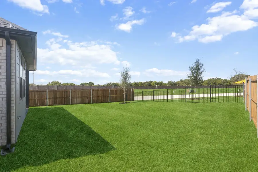 Backyard in the Magnolia home plan by Trophy Signature Homes – REPRESENTATIVE PHOTO Backyard in the Magnolia home plan by Trophy Signature Homes – REPRESENTATIVE PHOTO