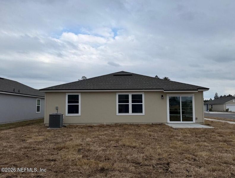 Exterior details and patio area of a home in The Arbors, Jacksonville (Image 4).