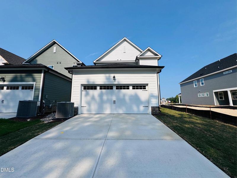 Front exterior of a new home in Forestville Yard, Knightdale, NC, highlighting curb appeal (Image 2). Front exterior of a new home in Forestville Yard, Knightdale, NC, highlighting curb appeal (Image 2).