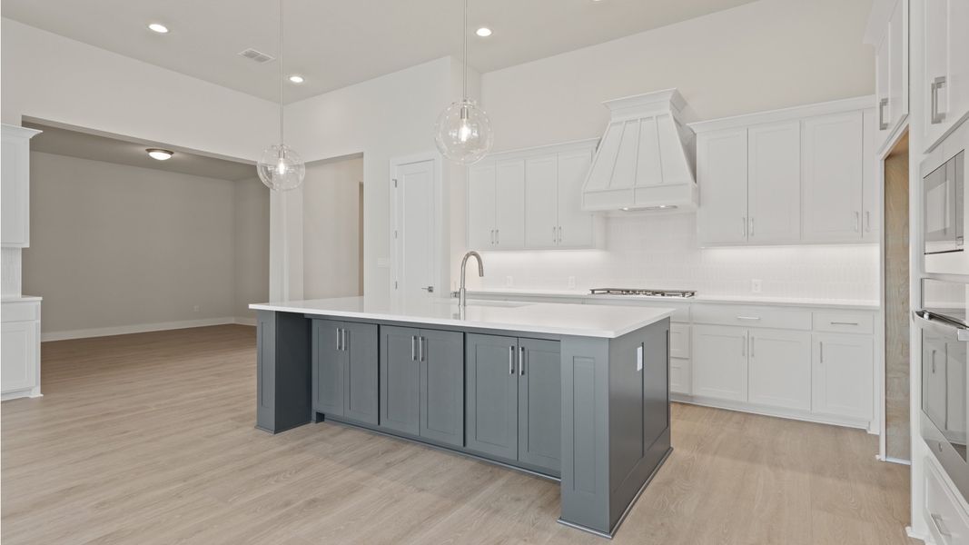 Furnished interior view inside a new home in Glynlea Country Club, Port St. Lucie (Image 3).